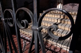 Wrought iron gate and shadows.