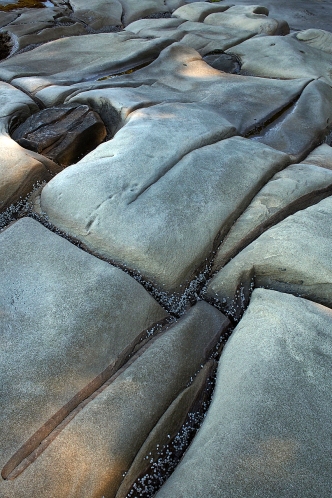 Erosional patterns in the rocks at Dinisio Point.